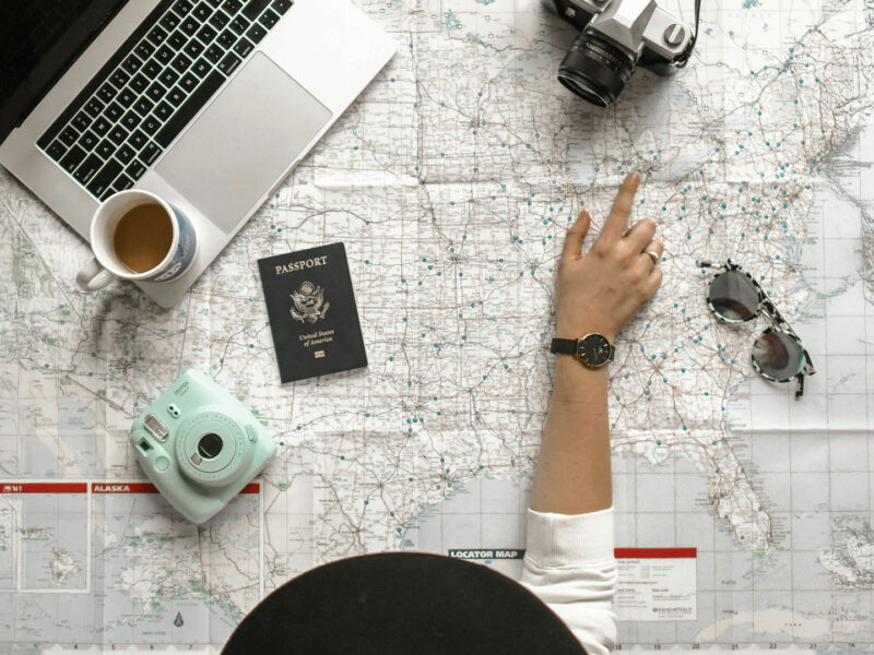 travel advisor woman laptop map planning